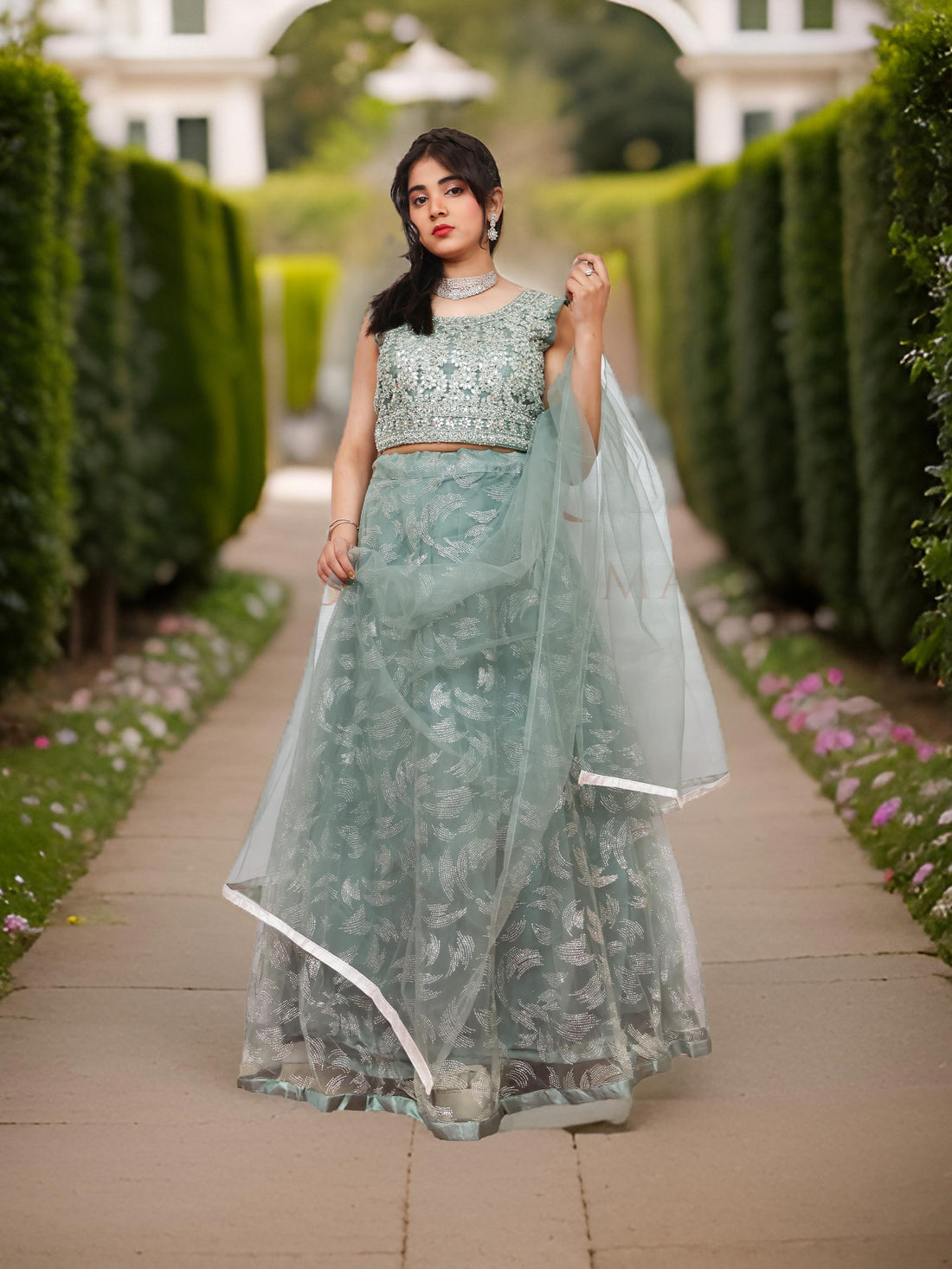 Mint Green Lehenga Choli Set with Golden Mirror Stone Work by Shreekama Mint Green Designer Lehenga for Party Festival Wedding Occasion in Noida